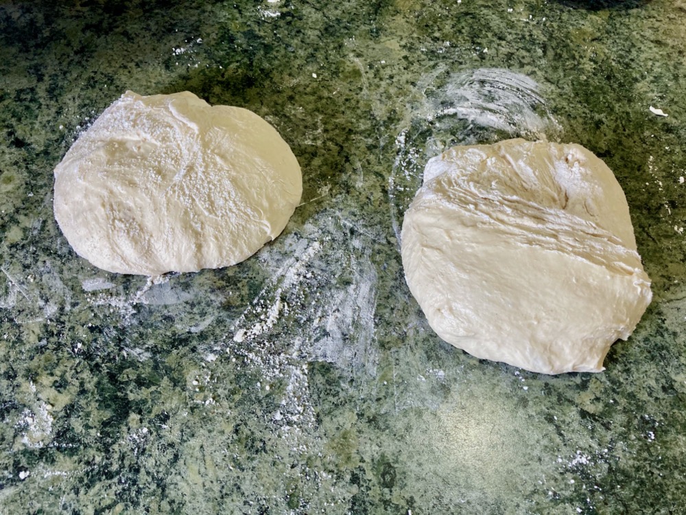 two balls of dough on a counter